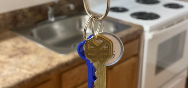 keys in front of a kitchen